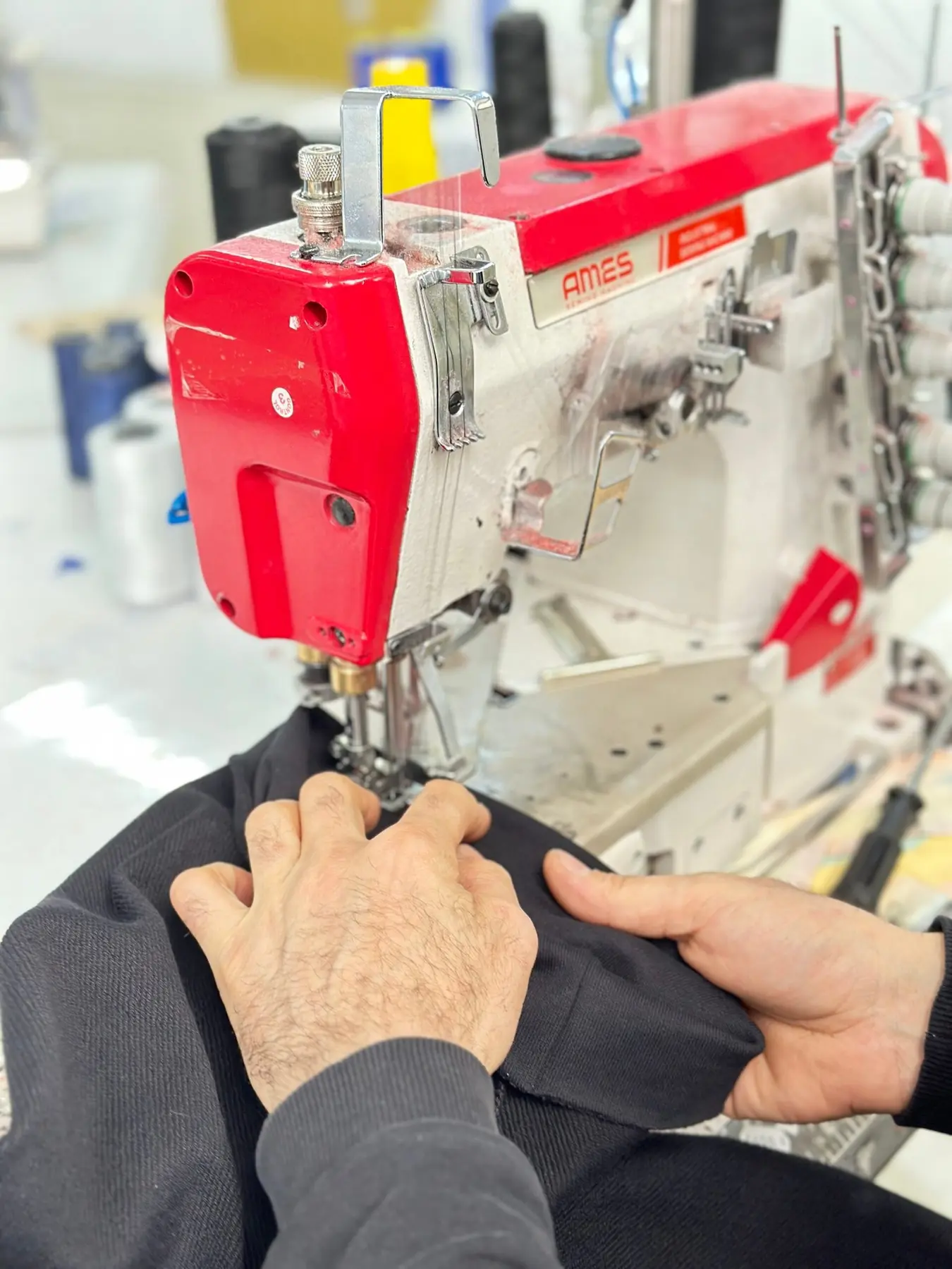 Industrial sewing detail during garment production
